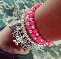 Tobillera triple dijes